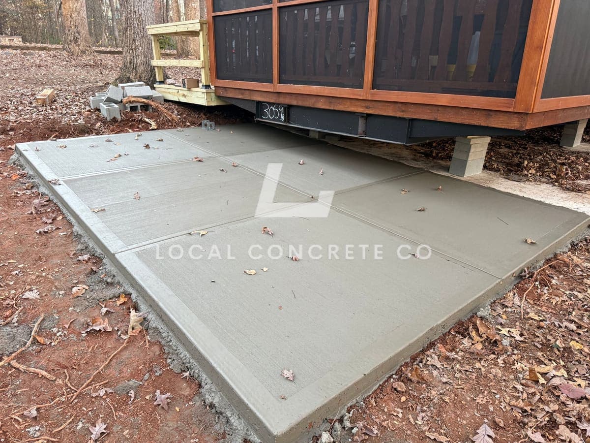 Professional Concrete Patios installation in Burlington, North Carolina by Local Concrete Contractor — commercial-grade base prep, 6-inch compacted aggregate, expansion joints sawn within 12 hours.