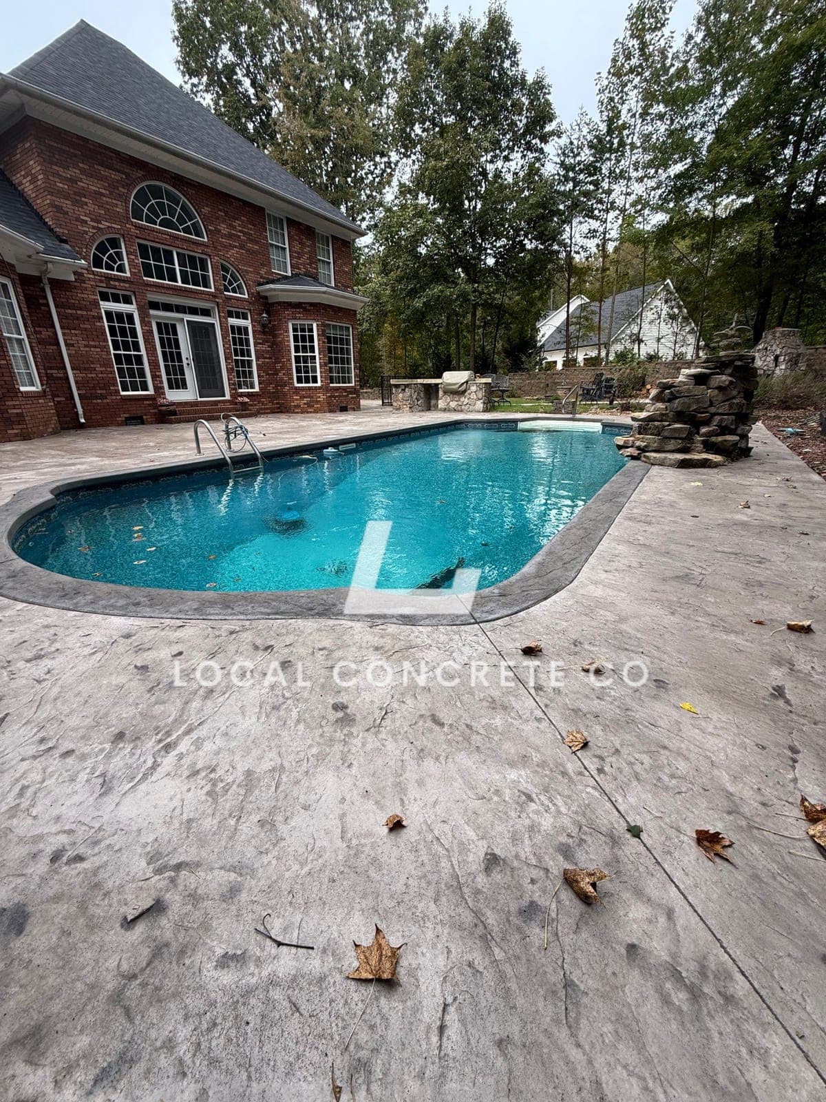 Newly poured Concrete Pool Decks in Durham, NC (Durham County) by Local Concrete Contractor — 4000 PSI mix, double-mat #4 rebar, broom-finish surface, 28-day full cure.
