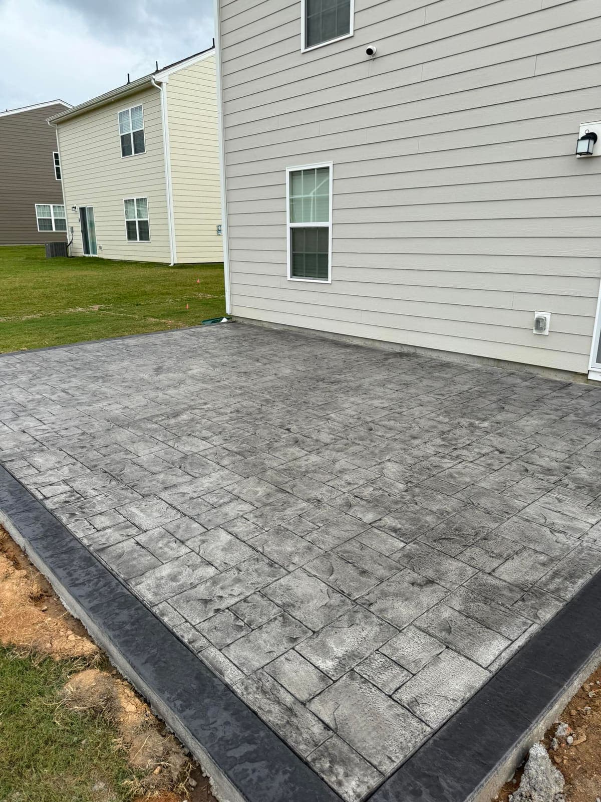 Completed Stamped Concrete installation in Monroe, NC by Local Concrete Contractor — concrete contractor serving the Charlotte metro and Triangle since 2018, no deposit, no progress payments.
